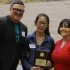 Virginia Association of Journalism Teachers and Advisers director, Chris Waugaman, Meilan Solly, and "The Husky Headline" adviser, Liz Staley