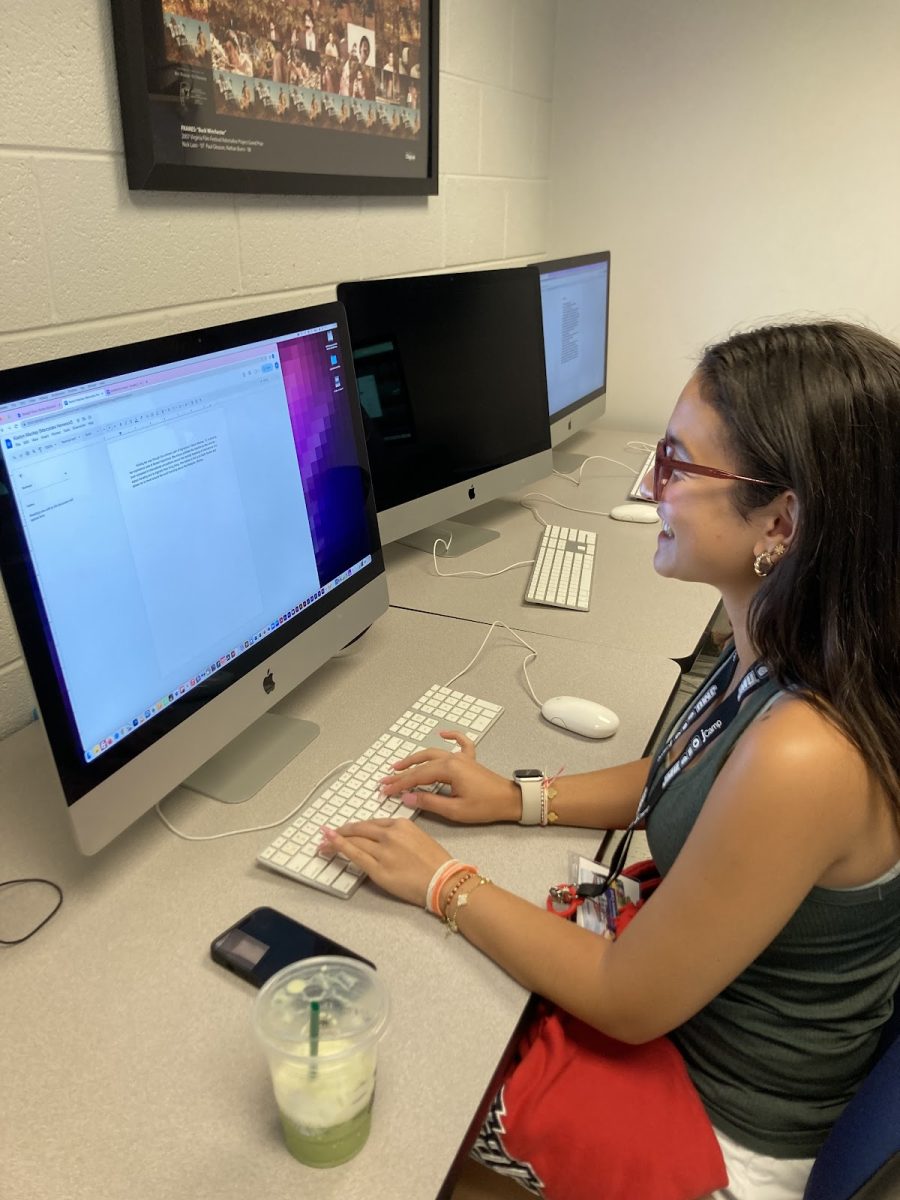 Mercedes Henwood works on a journalism profile at VAJTAs JCamp at JMU.