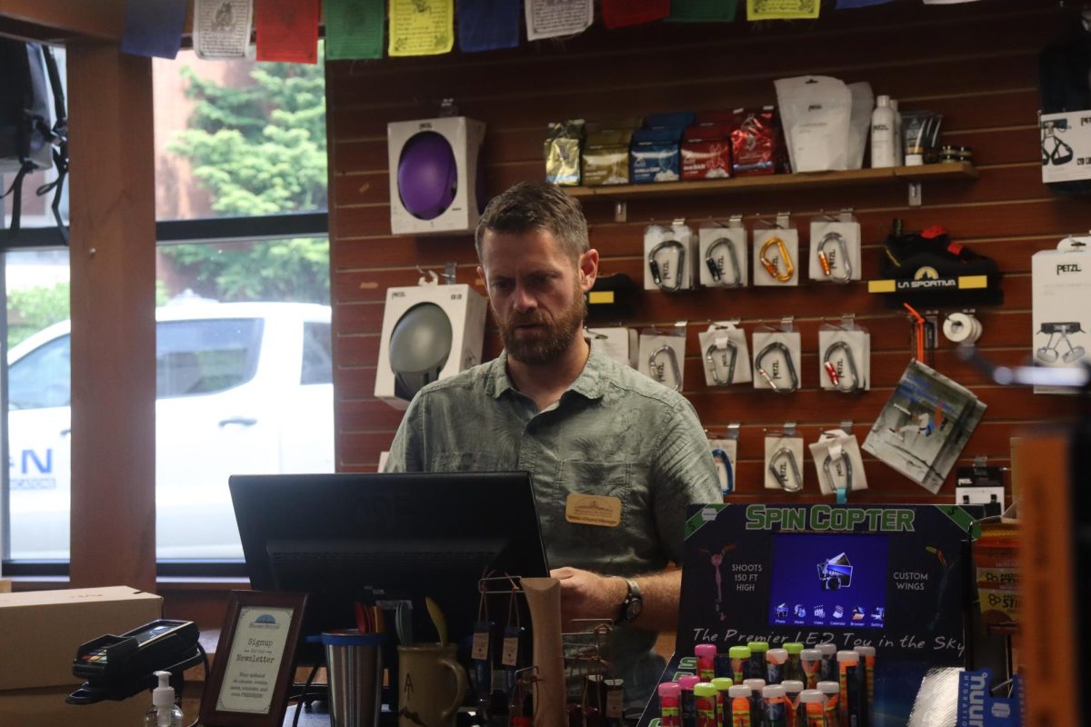 District manager of Walkabout Outfitters Vince Mier opens the Harrisonburg location on the morning of July 9. More than an avid hiker in his free time, Mier completed the entire Appalachian trail in 2011, spending five months and one day in the mountains. “It was just a dream come true. So it was just a matter of taking each day as it came,” Mier said.
